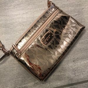 Rose gold Michael Kors wristlet